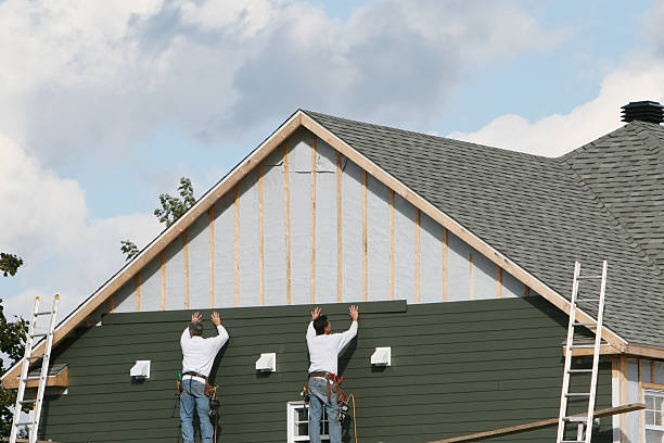 Professional Siding Contractor technician working in Lawrence, IN